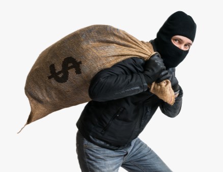 Masked thief with burlap bag of money