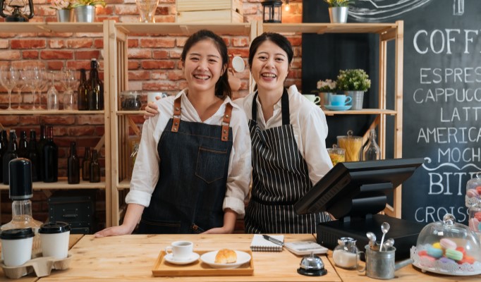 Two women coffee shop owners