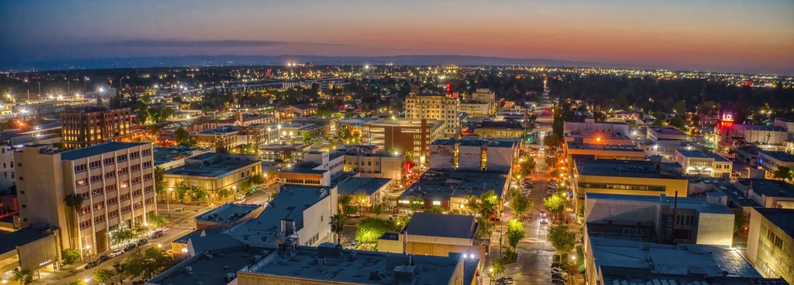 Aerial photo of city at twilight